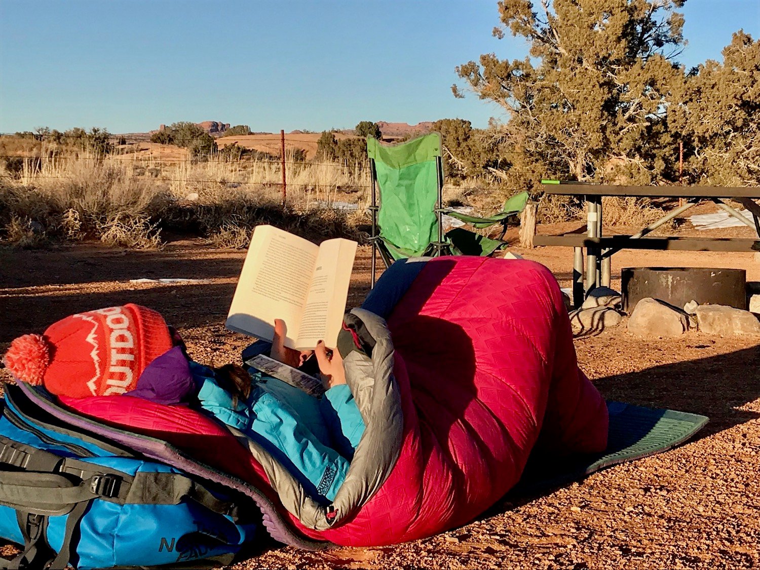 Slickrock Overnight. It doesn't always have to be a gnarly adventure––sometimes getting outside means reading a good book from the comfort of your sleeping bag.